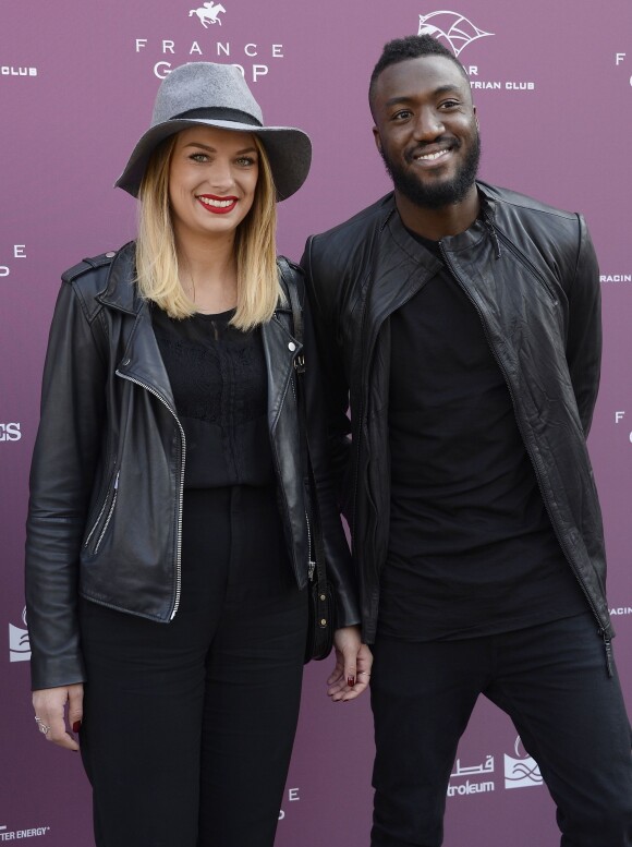 Luc Abalo et sa compagne - Photocall du 94ème Qatar Prix de l'Arc de Triomphe à l'Hippodrome de Longchamp à Paris, le 4 octobre 2015.