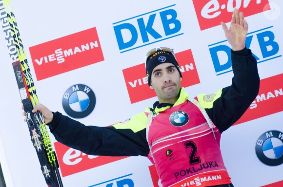 Martin Fourcade sur le podium du 15km Mass Start de la Coupe du monde à Pokljuka, le 21 décembre 2014