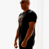 Vin Diesel, victime de body-shaming sur son dad bod (bedaine de papa), s'apprete à répondre. (photo postée le 11 octobre).