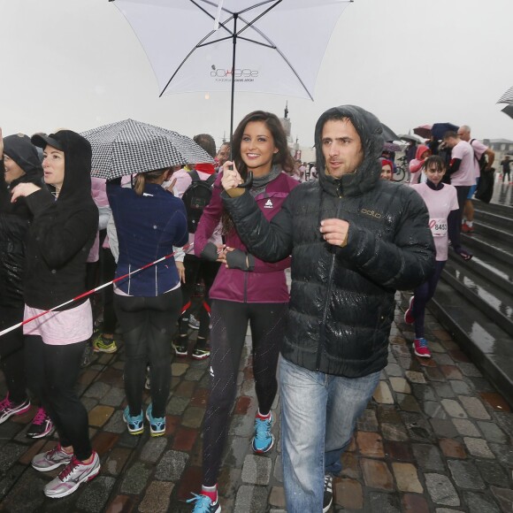 Exclusif - L'ancienne Miss France 2010, Malika Menard a pris le départ de la course à pied "Challenge Ruban Rose" de Bordeaux qui se déroule sur les quais de la ville le 18 Octobre 2015 afin de médiatiser la prévention et le dépistage du cancer du sein. Plus de 7000 participants sous une pluie battante ont accompagné Malika qui était ambassadrice de cette course urbaine et de la marque Odlo specialisée dans les sous-vêtements sportifs.