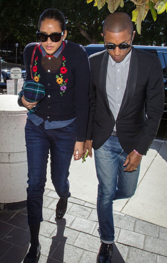 Pharrell Williams et sa femme Helen Lasichanh arrivent au procès qui l'oppose avec Robin Thicke, interprètes de "Blurred Lines", à la famille de Marvin Gaye au tribunal à Los Angeles, le 5 mars 2015