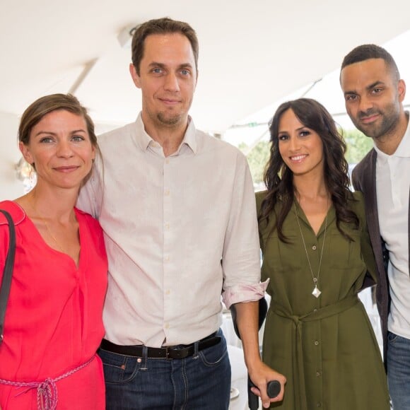 Exclusif - Grand Corps malade (Fabien Marsaud) et sa femme Julia avec Tony Parker et sa femme Axelle Francine - People lors du Longines Paris Eiffel Jumping au Champ-de-Mars à Paris, le 5 juillet 2015.