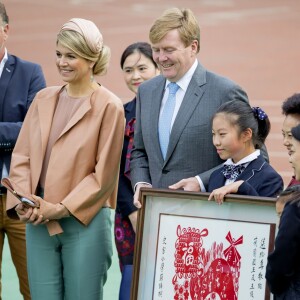 La reine Maxima des Pays-Bas lors du premier jour de sa visite officielle en Chine avec le roi Willem-Alexander, à Pekin le 25 octobre 2015. Souffrant de fièvre et de maux de dos, la reine ignorait encore qu'elle était atteinte d'une néphrite...