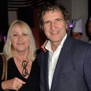 Gérard Leclerc et sa femme Julie - Cocktail pour le lancement du livre "Les bonnes chansons ne meurent jamais" de J. Sanchez au NoLita à Paris, le 4 novembre 2015. © Veeren/Bestimage