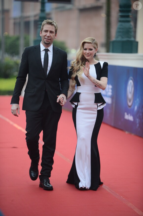 Avril Lavigne et son mari Chad Kroeger arrivent a la ceremonie d'ouverture du 10eme "Huading Awards" a Macao. Le 7 octobre 2013