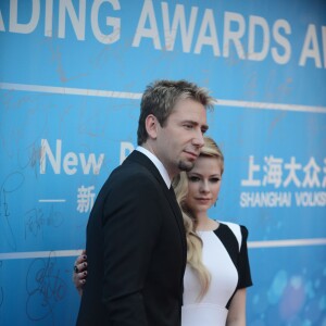 Avril Lavigne et son mari Chad Kroeger arrivent a la ceremonie d'ouverture du 10eme "Huading Awards" a Macao. Le 7 octobre 2013