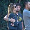 Mark Wahlberg et sa femme Rhea Durham soutiennent leur fils pendant un match de football à Woodland Hills le 7 novembre 2015.
