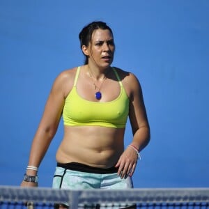 Marion Bartoli à l'entraînement du tournoi des Légendes avant l'Open d'Australie, le 24 janvier 2015 au Melbourne Park de Melbourne