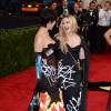 Katy Perry et Madonna habillées de robes Moschino - Met Gala 2015 au Metropolitan Museum. New York, le 4 mai 2015.
