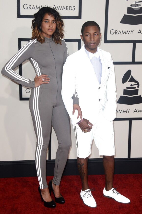 Helen Lasichanh et Pharrell Williams habillés de tenues adidas Originals - 57e édition des Grammy Awards au Staples Center. Los Angeles, le 8 février 2015.