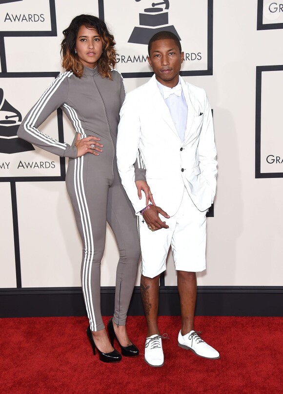 Helen Lasichanh et Pharrell Williams habillés de tenues adidas Originals - 57e édition des Grammy Awards au Staples Center. Los Angeles, le 8 février 2015.