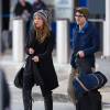 Exclusif - Darren Cris et sa petite amie Mia Swier arrivent à l'aéroport de New York, le 28 mars 2014.