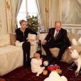 Jacques et Gabriella avec leurs parents - Interview de Charlene et Albert de Monaco au Salon des Glaces du Palais princier de Monaco, décembre 2015.