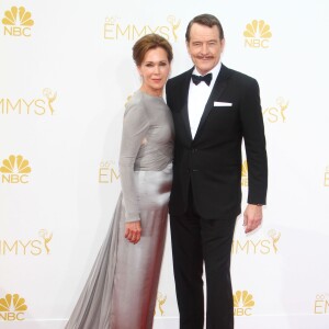 Bryan Cranston et sa femme Robin Dearden lors de la 66e cérémonie des Emmy Awards au Nokia Theatre L.A. Live de Los Angeles, le 25 août 2014