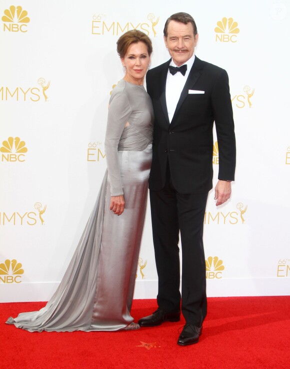 Bryan Cranston et sa femme Robin Dearden lors de la 66e cérémonie des Emmy Awards au Nokia Theatre L.A. Live de Los Angeles, le 25 août 2014