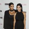 Kim Kardashian et Kourtney Kardashian au 50e annviersaire du magazine Cosmopolitan, à Los Angeles le 12 octobre 2015.