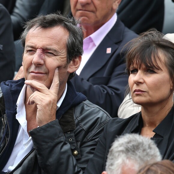 Jean-Luc Reichmann et sa femme Nathalie - People dans les tribunes des Internationaux de France de tennis de Roland Garros à Paris. Le 31 mai 2015.