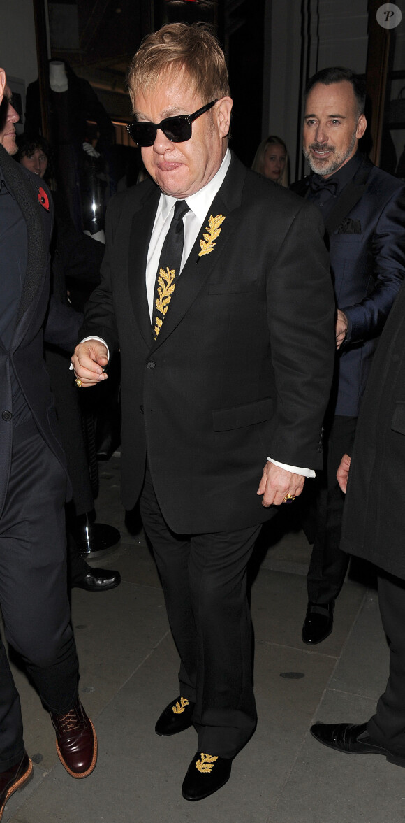 Elton John et son mari David Furnish - Arrivée des people à une soirée au flagship Burberry à Londres, le 3 novembre 2015.