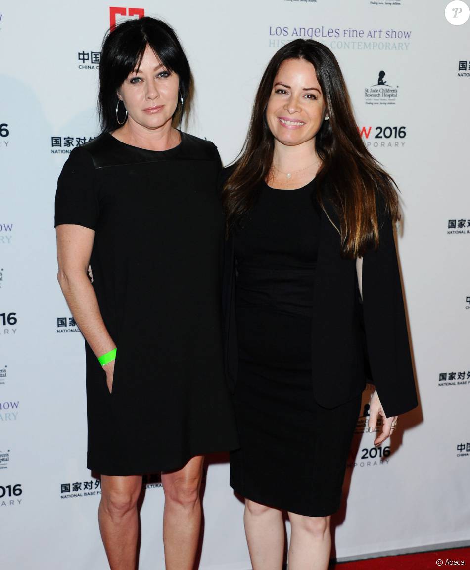 Shannen Doherty Et Son Bebe Shannen Doherty et Holly Marie Combs lors de la soirée d'ouverture du LA  Art Show à Los Angeles, le 27 janvier 2016. - Purepeople