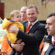 Wayne Rooney et son fils Klay à son arrivée à Old Trafford, le 5 octobre 2014 à Manchester