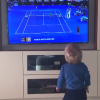 Stefan, le fils de Novak Djokovic et Jelena Ristice, regarde la finale de l'Open d'Australie entre son père et Andy Murray, le 31 janvier 2016