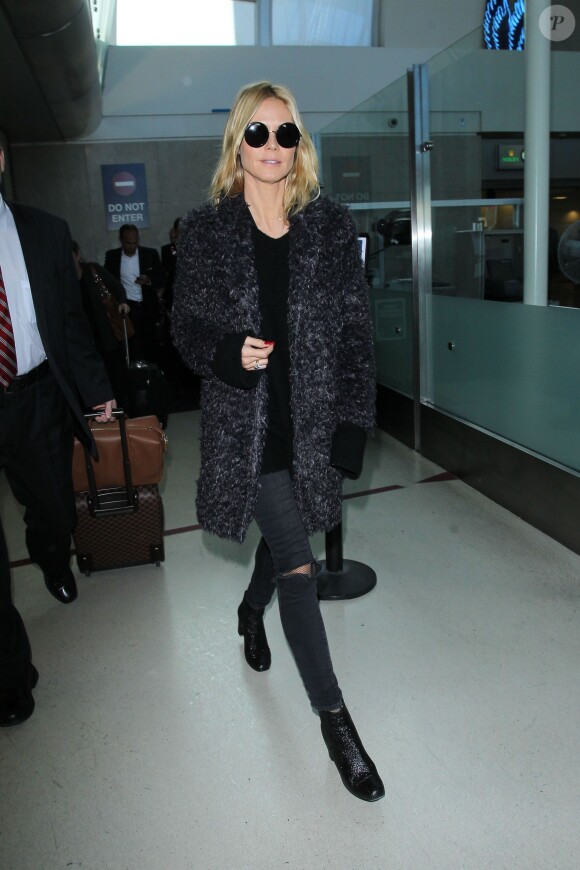 Heidi Klum arrive à l'aéroport de LAX à Los Angeles, le 15 décembre 2015