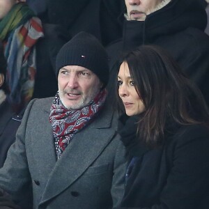 Frank Leboeuf et sa compagne Chrislaure Nollet lors de la rencontre entre le PSG et Chelsea en 8e de finale de la Ligue des champions, au Parc des Princes à Paris le 16 février 2016 © Cyril Moreau