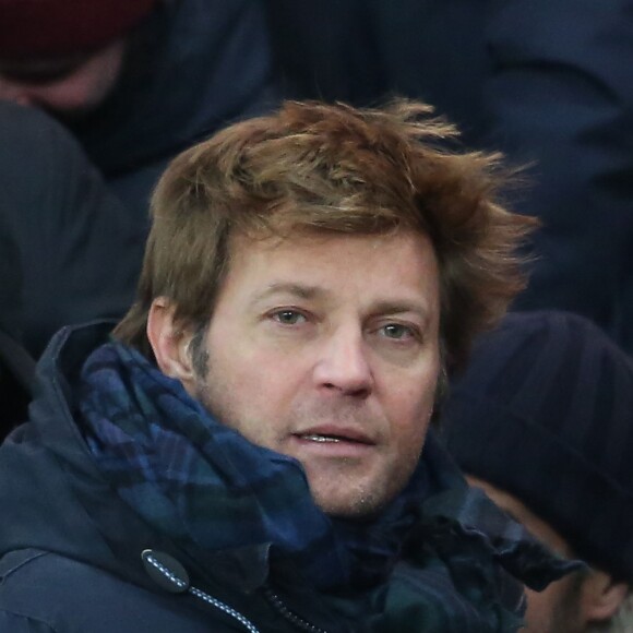 Laurent Delahousse lors de la rencontre entre le PSG et Chelsea en 8e de finale de la Ligue des champions, au Parc des Princes à Paris le 16 février 2016 © Cyril Moreau