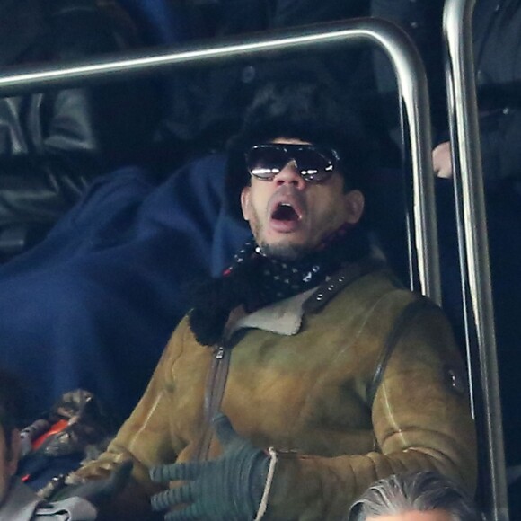 JoeyStarr lors de la rencontre entre le PSG et Chelsea en 8e de finale de la Ligue des champions, au Parc des Princes à Paris le 16 février 2016 © Cyril Moreau