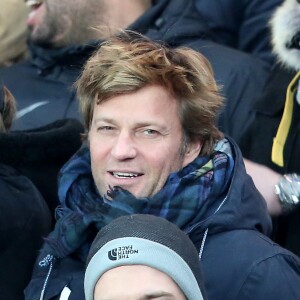 Laurent Delahousse lors de la rencontre entre le PSG et Chelsea en 8e de finale de la Ligue des champions, au Parc des Princes à Paris le 16 février 2016 © Cyril Moreau