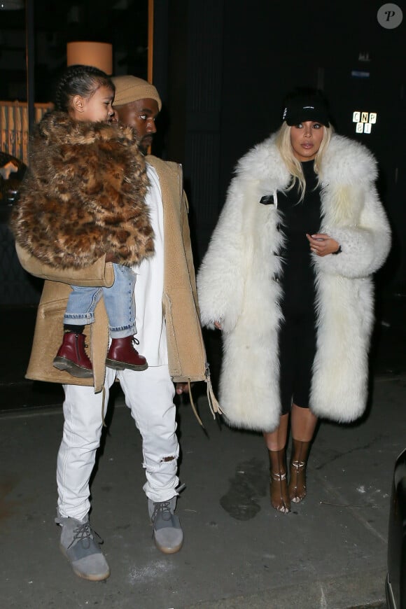 Kanye West, Kim Kardashian et leur fille North West à New York, le 14 février 2016.