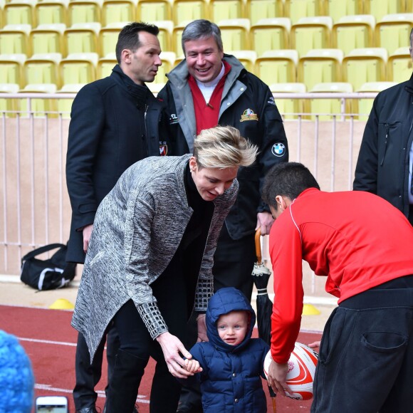 La princesse Charlene de Monaco assiste, en compagnie de son fils le prince héritier Jacques, au 6ème "Tournoi Sainte Dévote" de Rugby, le samedi 27 février 2016, au Stade Louis II à Monaco. © Bruno Bebert / Bestimage