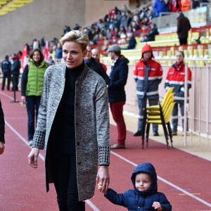 La princesse Charlene de Monaco assiste, en compagnie de son fils le prince héritier Jacques, au 6ème "Tournoi Sainte Dévote" de Rugby, le samedi 27 février 2016, au Stade Louis II à Monaco. © Bruno Bebert / Bestimage