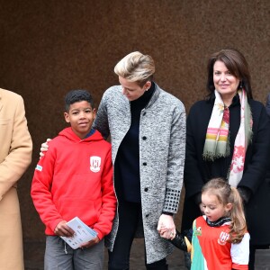 La princesse Charlene de Monaco assiste, en compagnie de son fils le prince héritier Jacques, au 6ème "Tournoi Sainte Dévote" de Rugby, le samedi 27 février 2016, au Stade Louis II à Monaco. © Bruno Bebert / Bestimage