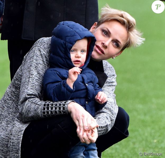 La princesse Charlene de Monaco assiste, en compagnie de son fils le prince héritier Jacques, au 6ème "Tournoi Sainte Dévote" de Rugby, le samedi 27 février 2016, au Stade Louis II à Monaco. © Bruno Bebert / Bestimage