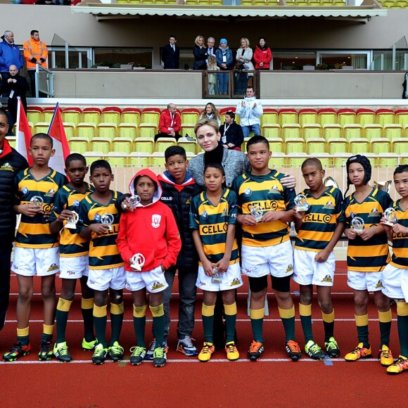 La princesse Charlene de Monaco assiste, en compagnie de son fils le prince héritier Jacques, au 6ème "Tournoi Sainte Dévote" de Rugby, le samedi 27 février 2016, au Stade Louis II à Monaco. © Bruno Bebert / Bestimage