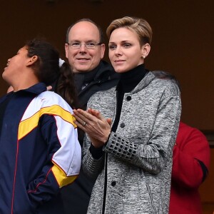 La princesse Charlene de Monaco assiste, en compagnie de son fils le prince héritier Jacques et époux Albert de Monaco, au 6ème "Tournoi Sainte Dévote" de Rugby, le samedi 27 février 2016, au Stade Louis II à Monaco. © Bruno Bebert / Bestimage