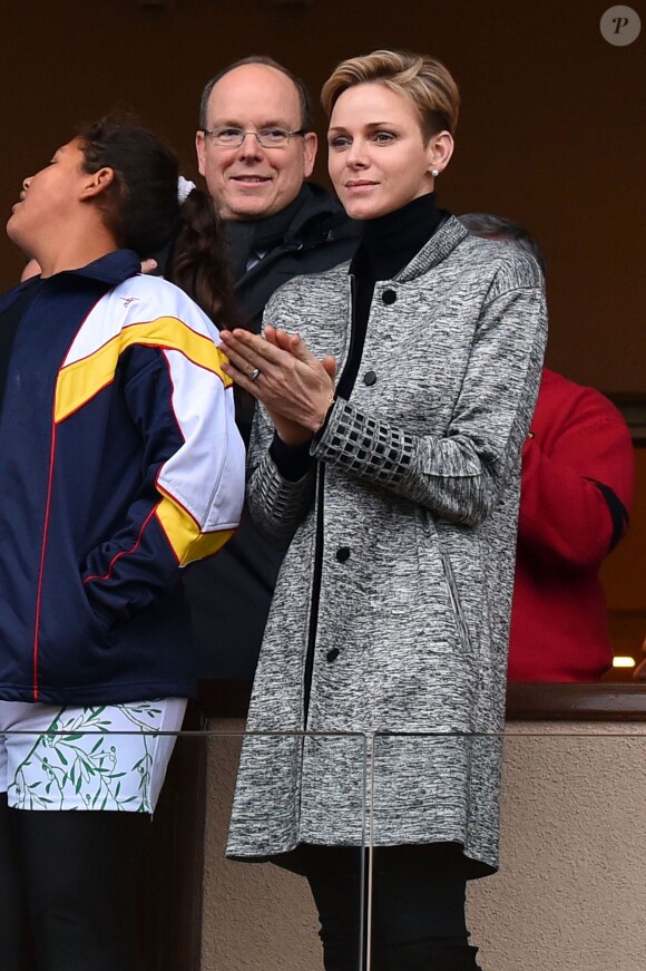 La princesse Charlene de Monaco assiste, en compagnie de son fils le prince héritier Jacques et époux Albert de Monaco, au 6ème "Tournoi Sainte Dévote" de Rugby, le samedi 27 février 2016, au Stade Louis II à Monaco. © Bruno Bebert / Bestimage