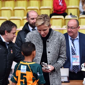 La princesse Charlene de Monaco assiste, en compagnie de son fils le prince héritier Jacques, au 6ème "Tournoi Sainte Dévote" de Rugby, le samedi 27 février 2016, au Stade Louis II à Monaco. Elle a remis des récompenses. © Bruno Bebert / Bestimage