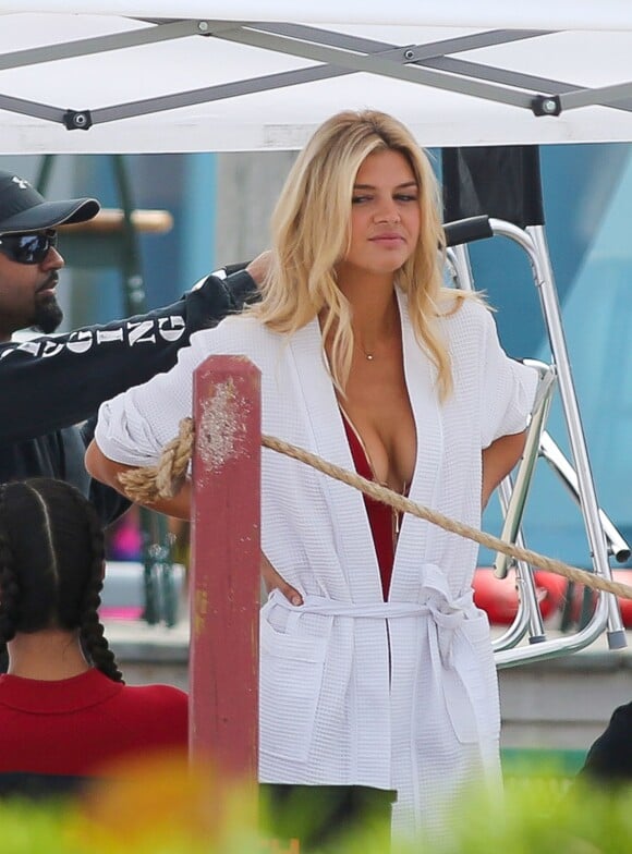Sports Illustrated model Kelly Rohrbach finally dons the famous red itty bitty red one piece for Baywatch!, as she filmed scenes with co-star Ilfenesh Hadera. The model and actress looked sultry and sexy in the red one piece channeling her inner Pamela Anderson. She fit snug into the new version of the iconic suit in a low cut zipped up one piece with the words 'Lifeguard' straight down the back. She was fit and toned and looked perfect for the role while filming in Miami Beach. Miami, FL, USA on March 4, 2016. Photo by GSI/ABACAPRESS.COM04/03/2016 - Miami