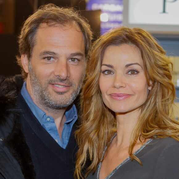 Ingrid Chauvin et son mari Thierry Peythieu au salon du livre à la porte de Versailles à Paris le 22 mars 2015