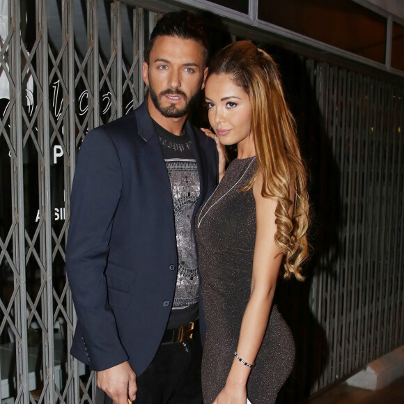 Nabilla Benattia et son petit ami Thomas Vergara - People à la sortie de la boite de nuit "Cosy Box" à Cannes, le 17 mai 2014.