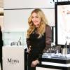 Madonna fait la promotion de sa ligne de cosmétiques à la boutique Mitsukoshi à Tokyo, le 15 février 2016
