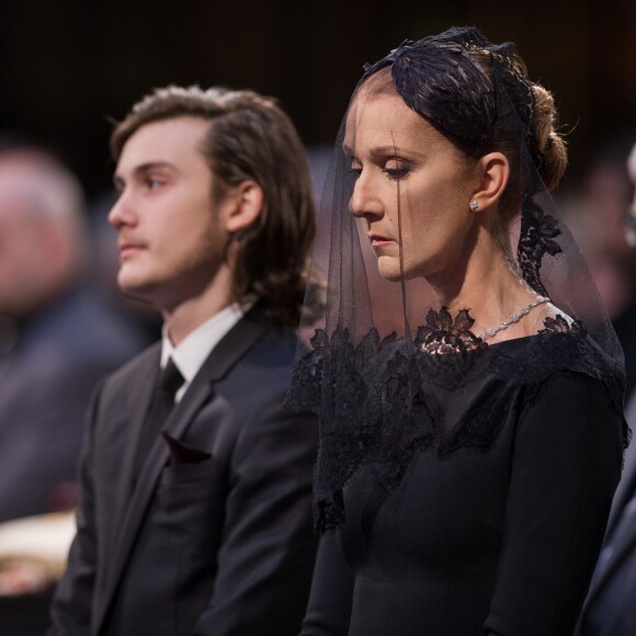 Céline Dion et son fils René-Charles Angélil aux obsèques nationales de René Angélil en la Basi­lique Notre-Dame de Montréal, le 22 janvier 2016. © Annie Paquin / OSAIMAGES / FEELING