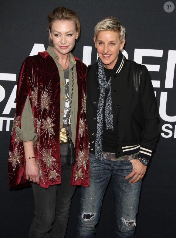 Portia De Rossi et sa femme Ellen DeGeneres au défilé Saint Laurent à Hollywood le 10 février 2016.