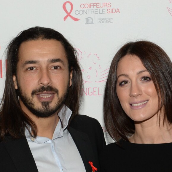 Moundir et sa femme Inès lors de l'opération "Coiffeurs Contre le Sida" édition 2014 à l'Académie L'Oréal Produits Professionnels à Paris, le 1er décembre 2014.