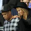 Jay-Z et Beyonce au match PSG-Barcelone de la Ligue des Champions 2014 au parc des princes à Paris le 30 septembre 2014.