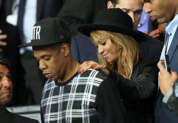 Jay-Z et Beyonce au match PSG-Barcelone de la Ligue des Champions 2014 au parc des princes à Paris le 30 septembre 2014.