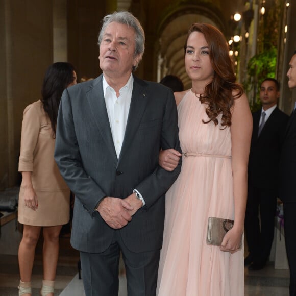 Alain Delon et Anouchka Delon Salvatore Ferragamo Collezione Resort P/E 2013 People Louvre Paris France 12-06-12 ©SGP