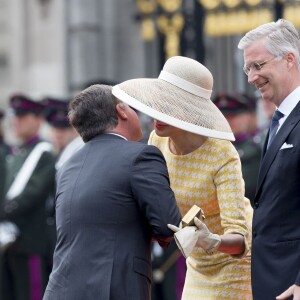 Le roi Abdallah II et la reine Rania de Jordanie sont accueillis au Palais Royal par le roi Philippe et la reine Mathilde de Belgique, pour une réception, à l'occasion d'une visite d'état de trois jours en Belgique. Bruxelles, 18 mai 2016.